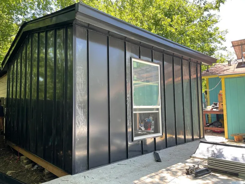 Black standing seam metal wall panels for Roof Inspection in Kailua