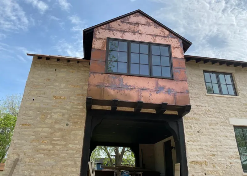 Copper metal panel facade on a stone building for Metal Roof Coating in Kailua